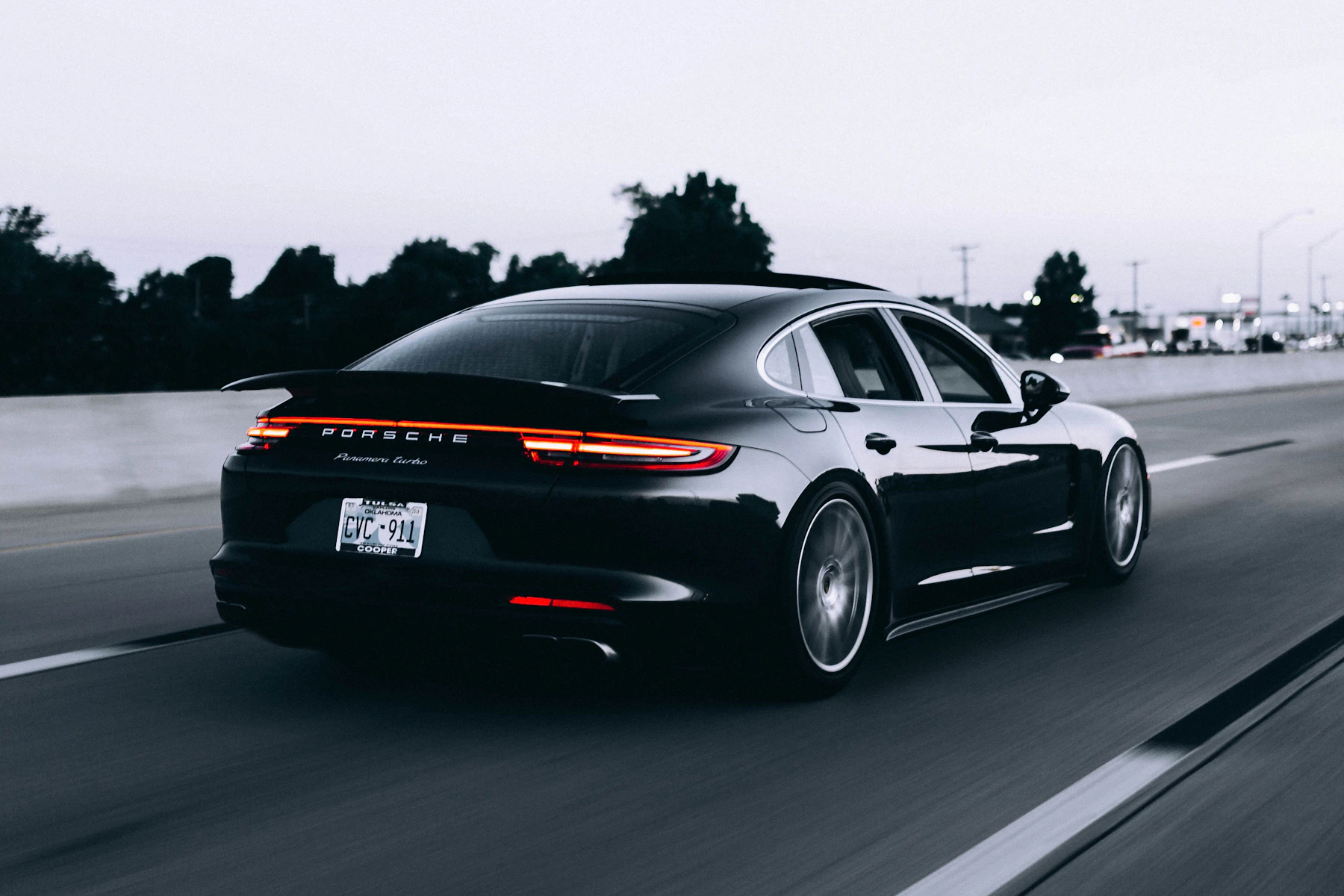 Illustrative sports car on a road, not a customer vehicle